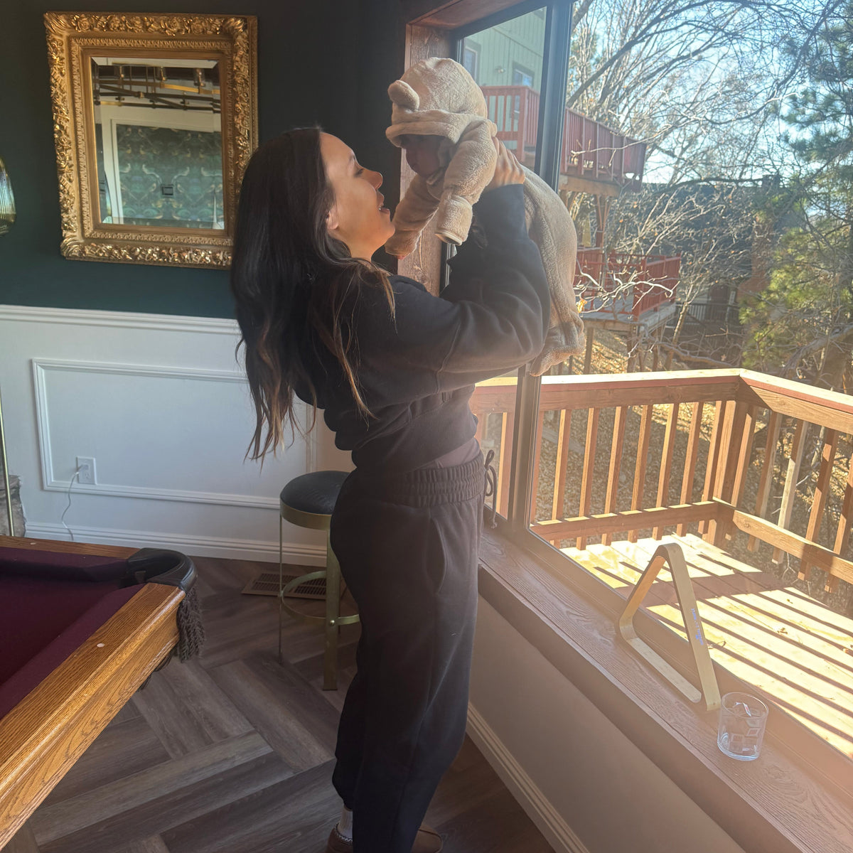 Harlow Baby founder Alyce holding her baby before starting Harlow Baby